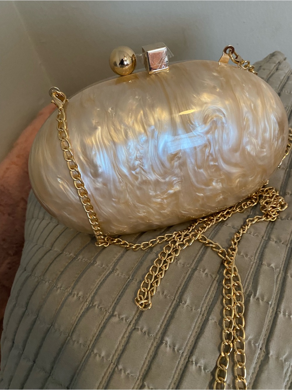 Pearlescent Beige Oval Clutch with Gold Chain